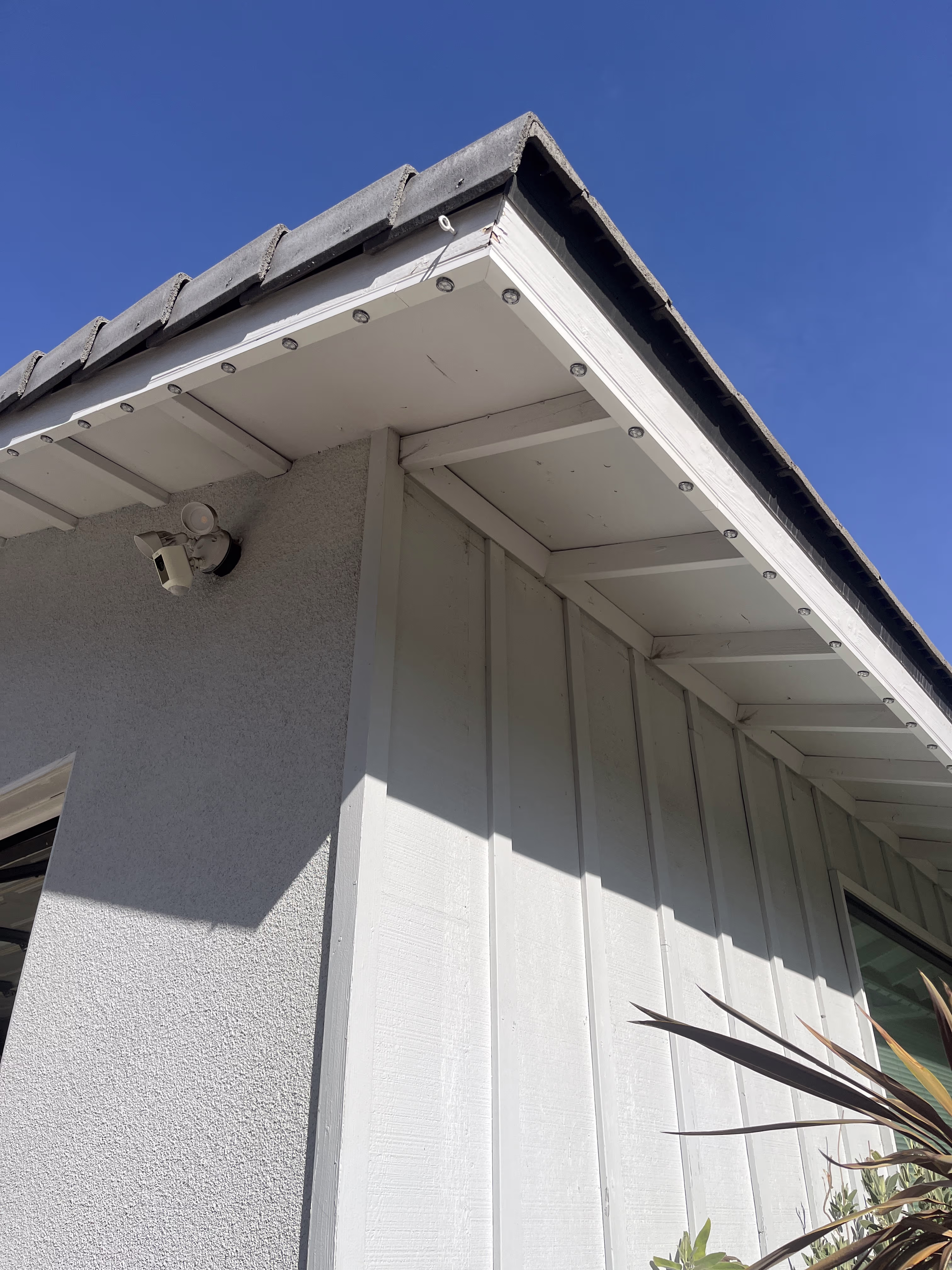 Close view of Strata lighting installed in color-matched track