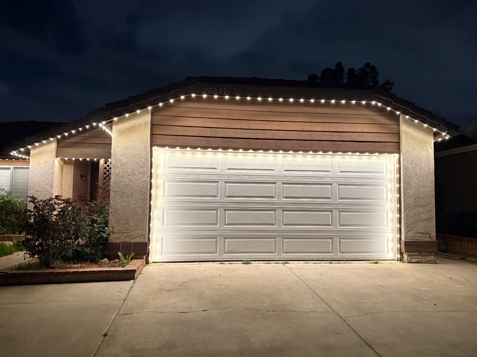 Bright permanent lighting following multiple roof peaks